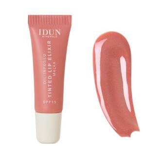 IDUN Minerals atspalvį suteikiantis lūpų aliejus-eliksyras Malva (spalva koralinė smėlio - Coral Beige), 8 ml